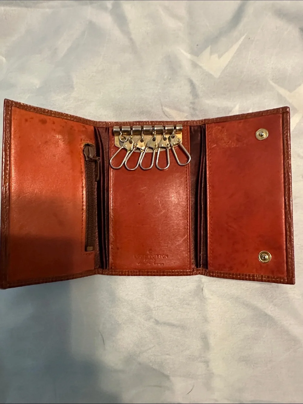 Louis Vuitton Embossed Epi Leather Card Holder in Brown